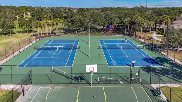 a view of a pool with a yard