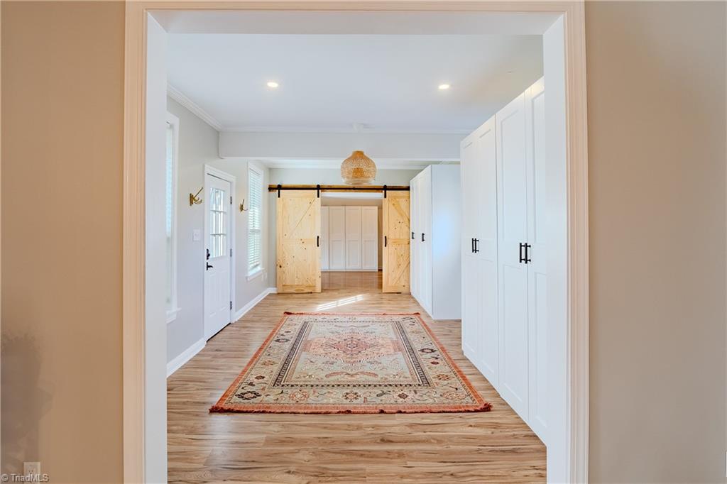 1009 Ray Loop Road Westfield, NC 27053 - Photo 28 of 45 From kitchen looking into foyer towards bunkrooms with tons of storage