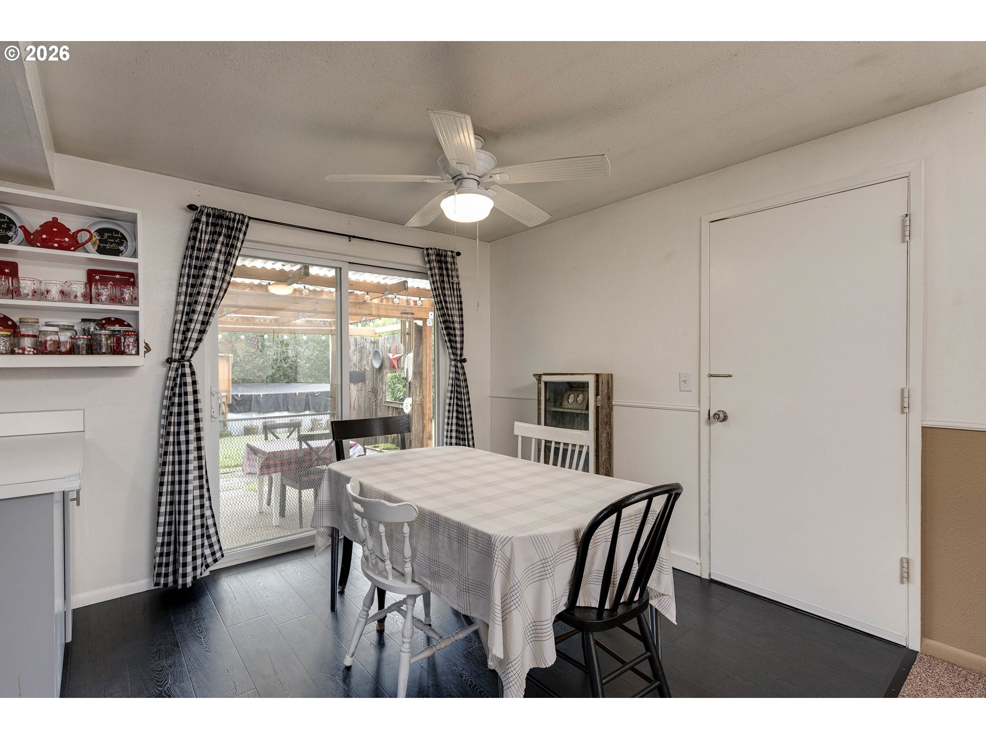 18430 Southwest Broad Oak Boulevard Aloha, OR 97007 - Photo 19 of 32 a view of a dining room with furniture window and wooden floor