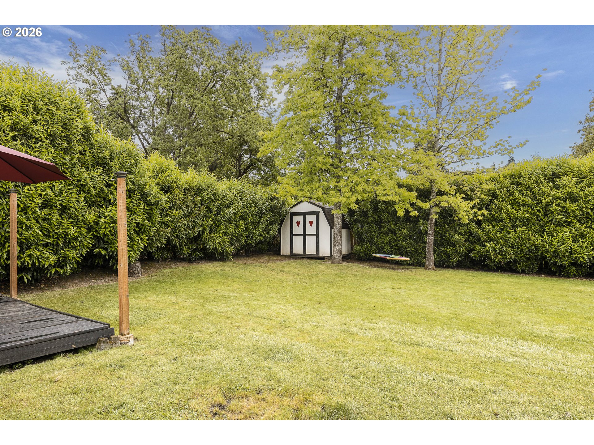 18430 Southwest Broad Oak Boulevard Aloha, OR 97007 - Photo 27 of 32 a view of an outdoor space and basketball court