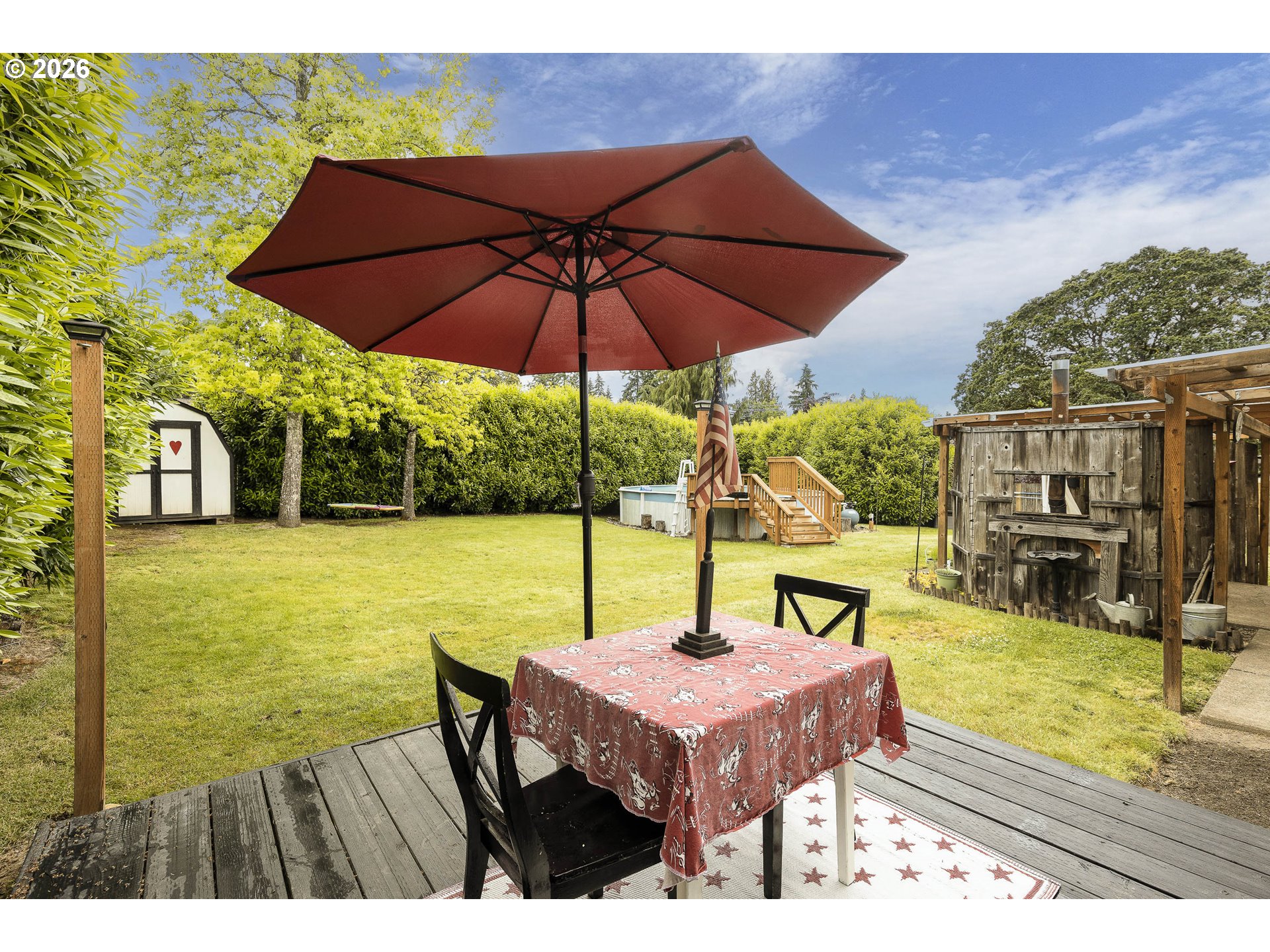 18430 Southwest Broad Oak Boulevard Aloha, OR 97007 - Photo 29 of 32 a view of a patio with swimming pool