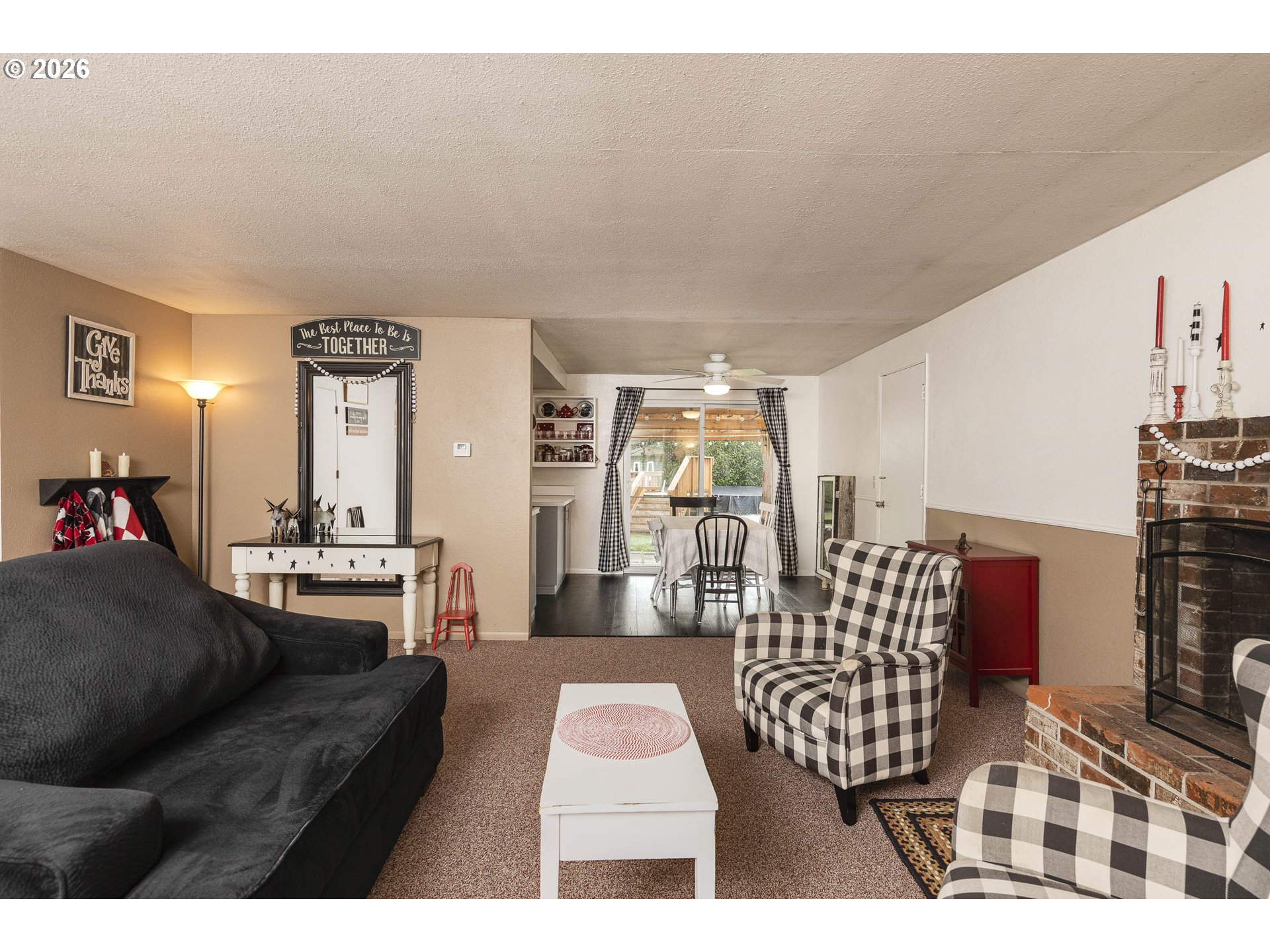 18430 Southwest Broad Oak Boulevard Aloha, OR 97007 - Photo 6 of 32 a living room with furniture and wooden floor