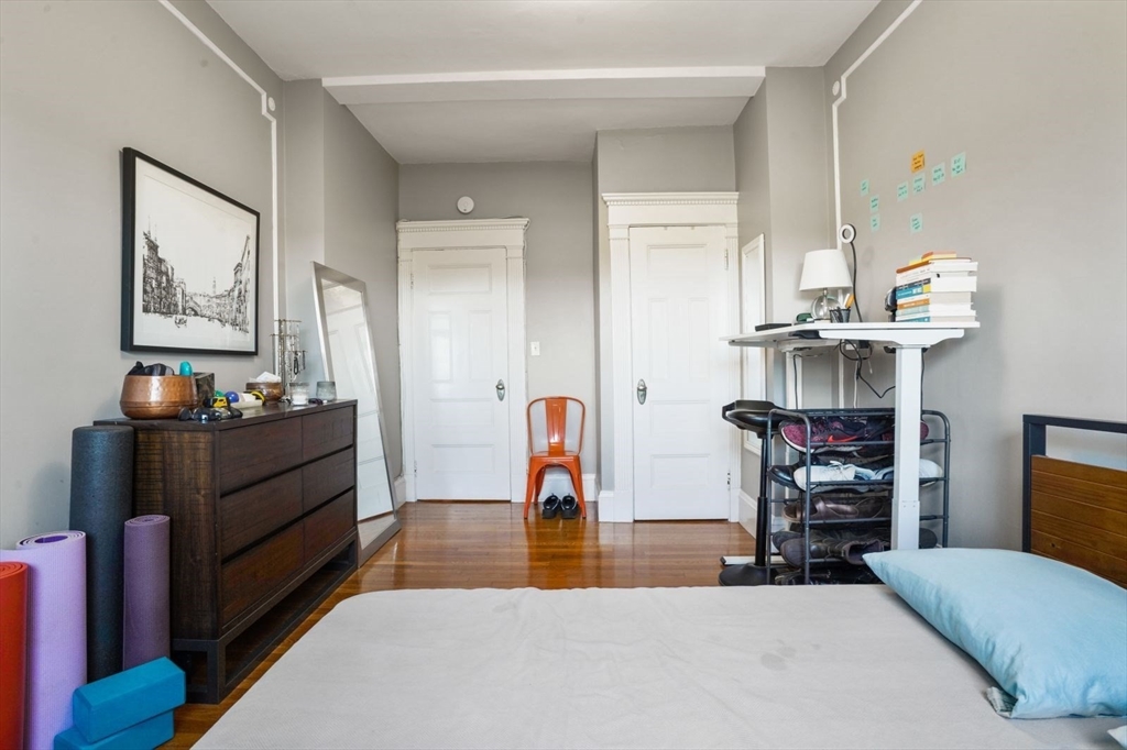 8 Garrison Street, Unit 706 Boston, MA 02116 - Photo 6 of 14 a living room with furniture and a fireplace