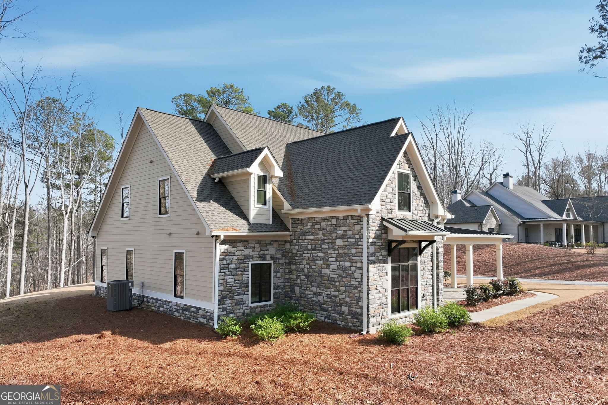 1282 Dean Hill Road Southeast Monroe, GA 30655 - Photo 19 of 58 a view of a large house with a yard