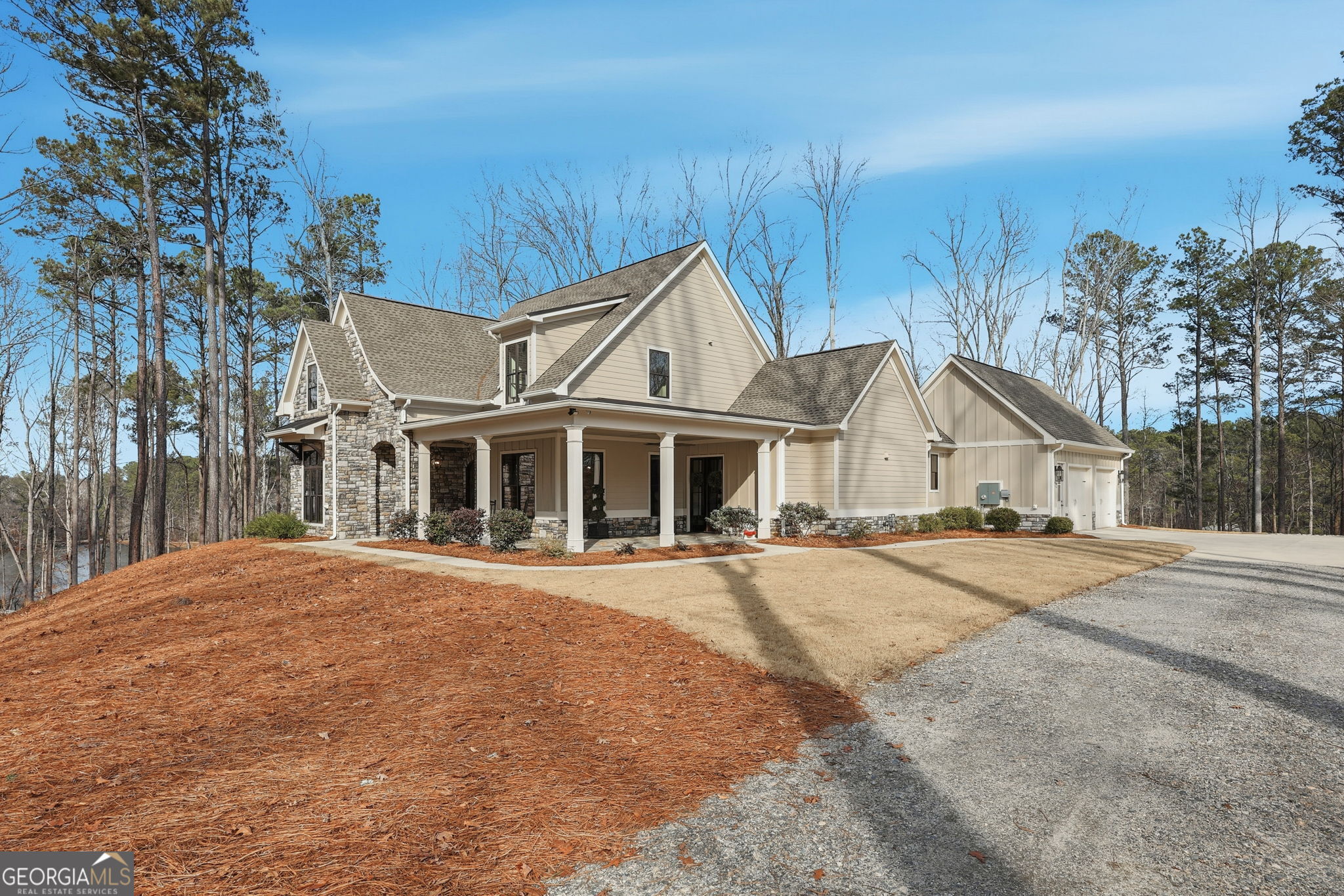 1282 Dean Hill Road Southeast Monroe, GA 30655 - Photo 2 of 58 a front view of a house with a yard and garage