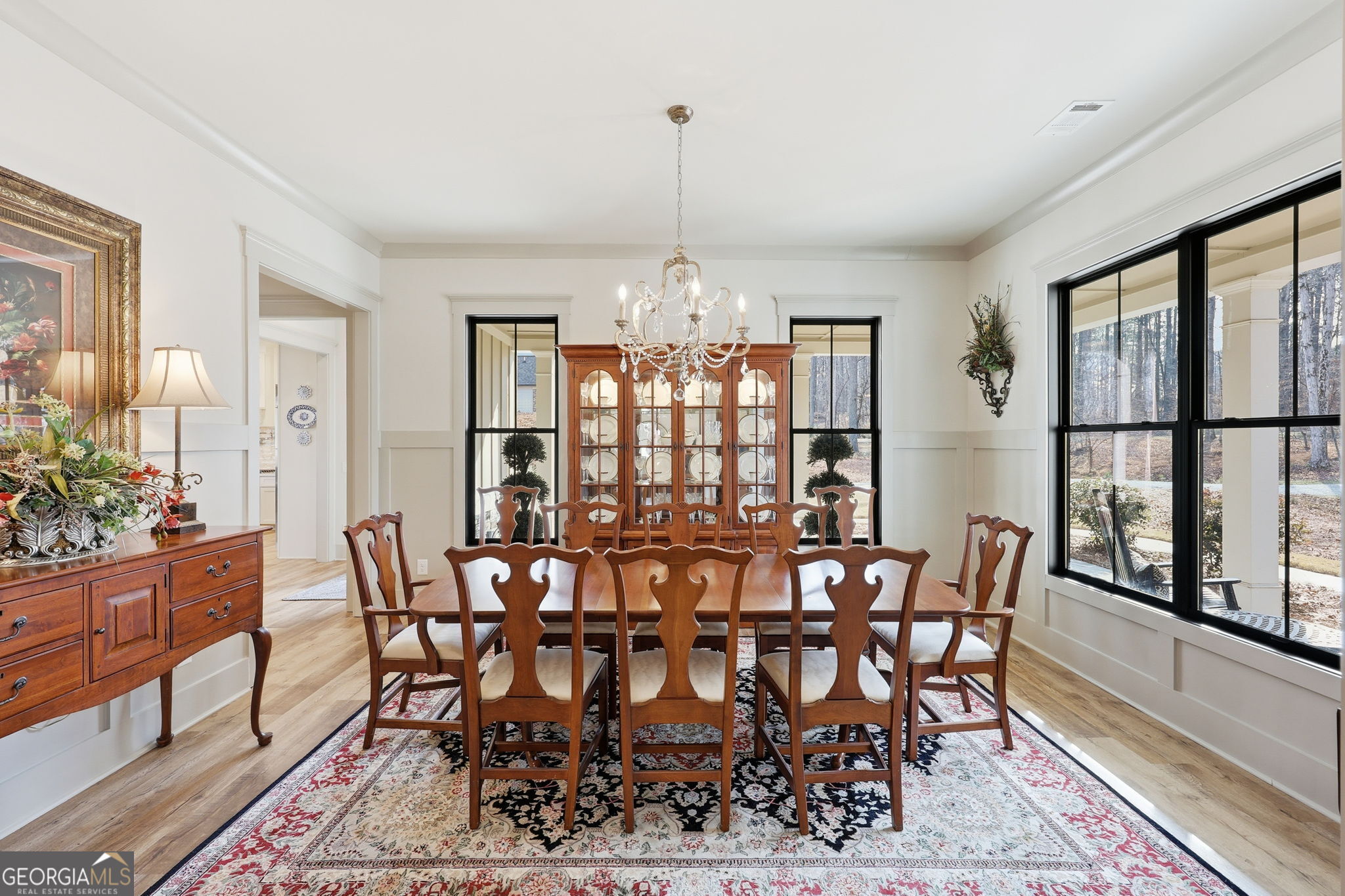 1282 Dean Hill Road Southeast Monroe, GA 30655 - Photo 25 of 58 a view of a dining room with furniture window and wooden floor