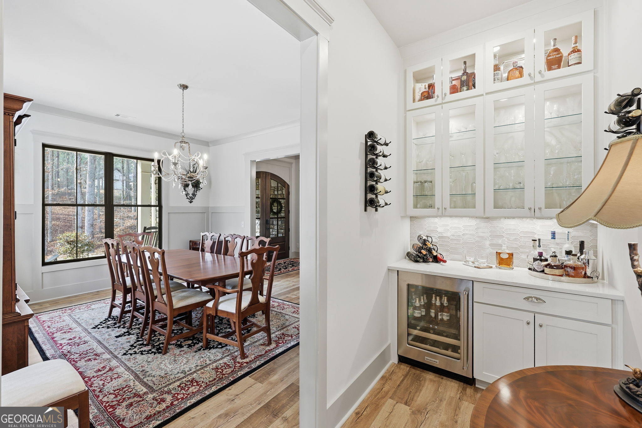 1282 Dean Hill Road Southeast Monroe, GA 30655 - Photo 27 of 58 a dining room with furniture a chandelier and window