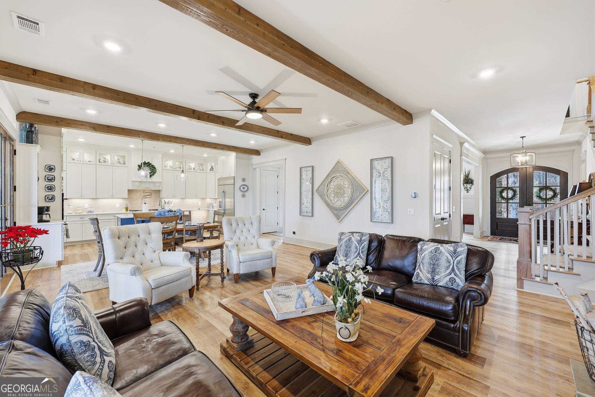 1282 Dean Hill Road Southeast Monroe, GA 30655 - Photo 31 of 58 a living room with furniture and wooden floor
