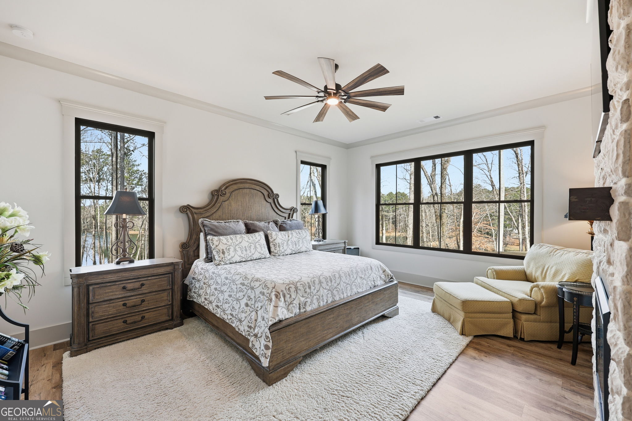 1282 Dean Hill Road Southeast Monroe, GA 30655 - Photo 40 of 58 a bedroom with a bed window and a couch