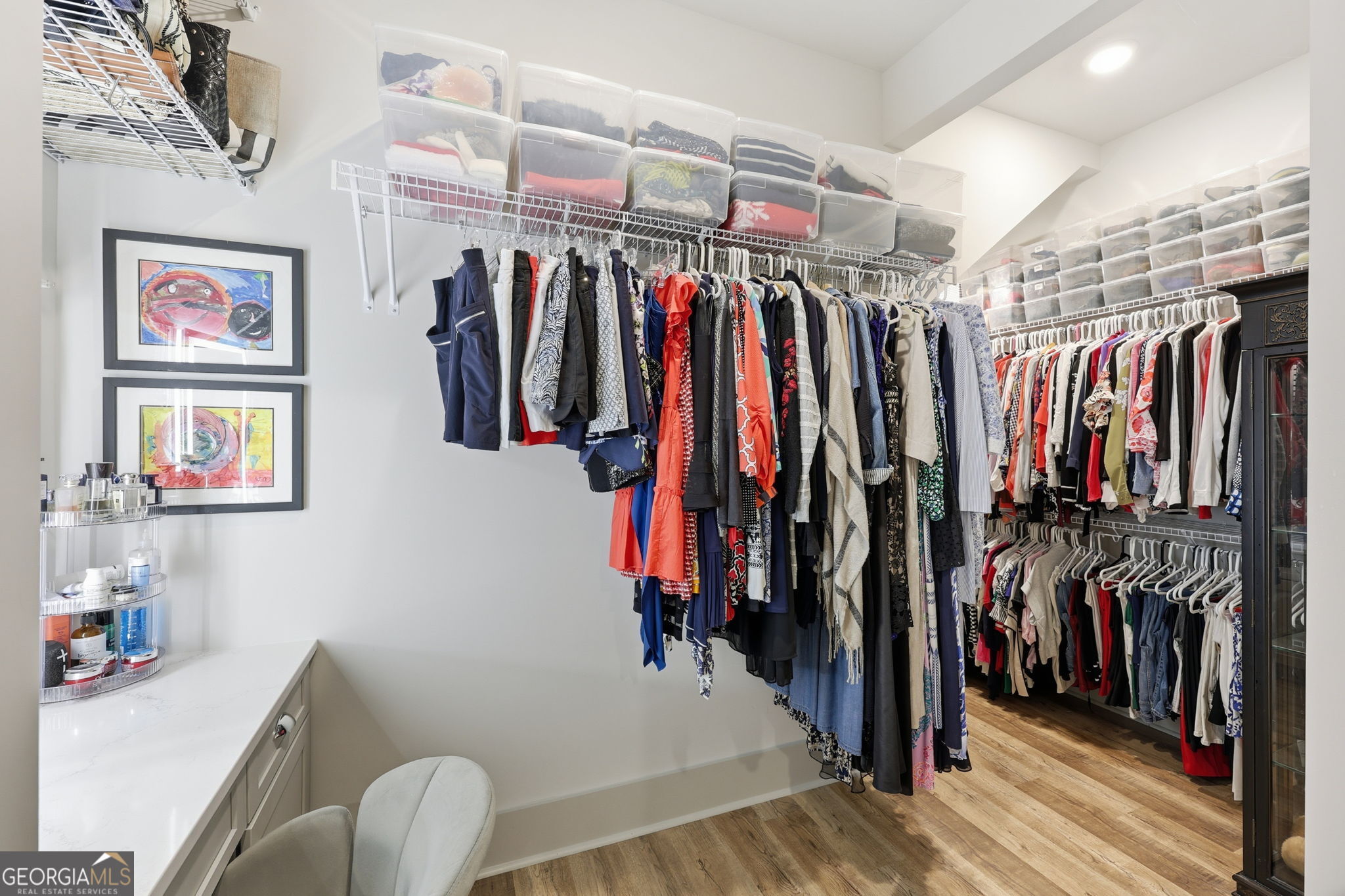 1282 Dean Hill Road Southeast Monroe, GA 30655 - Photo 43 of 58 a view of walk in closet with clothes