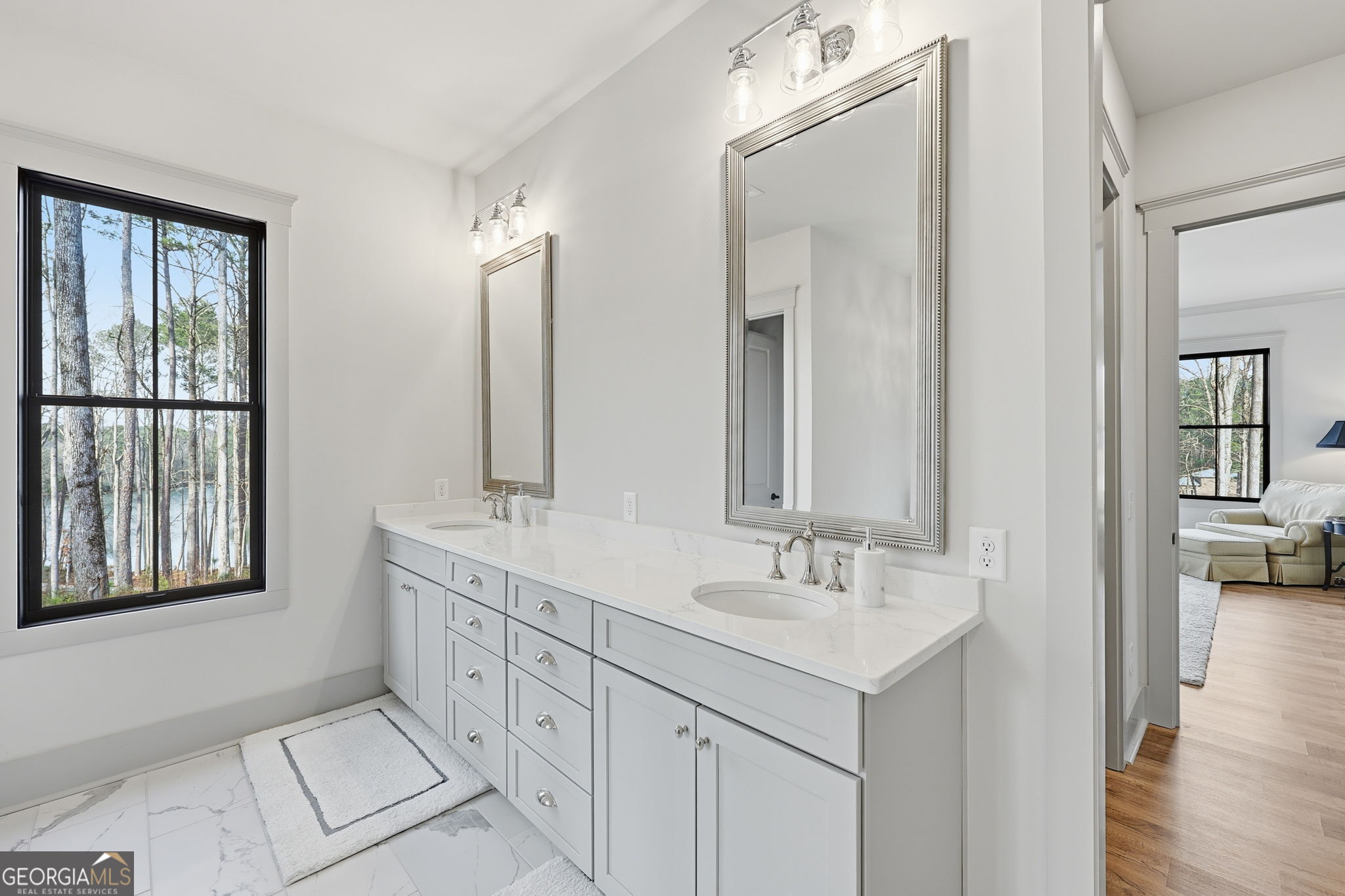 1282 Dean Hill Road Southeast Monroe, GA 30655 - Photo 46 of 58 a bathroom with 2 sink and a mirror