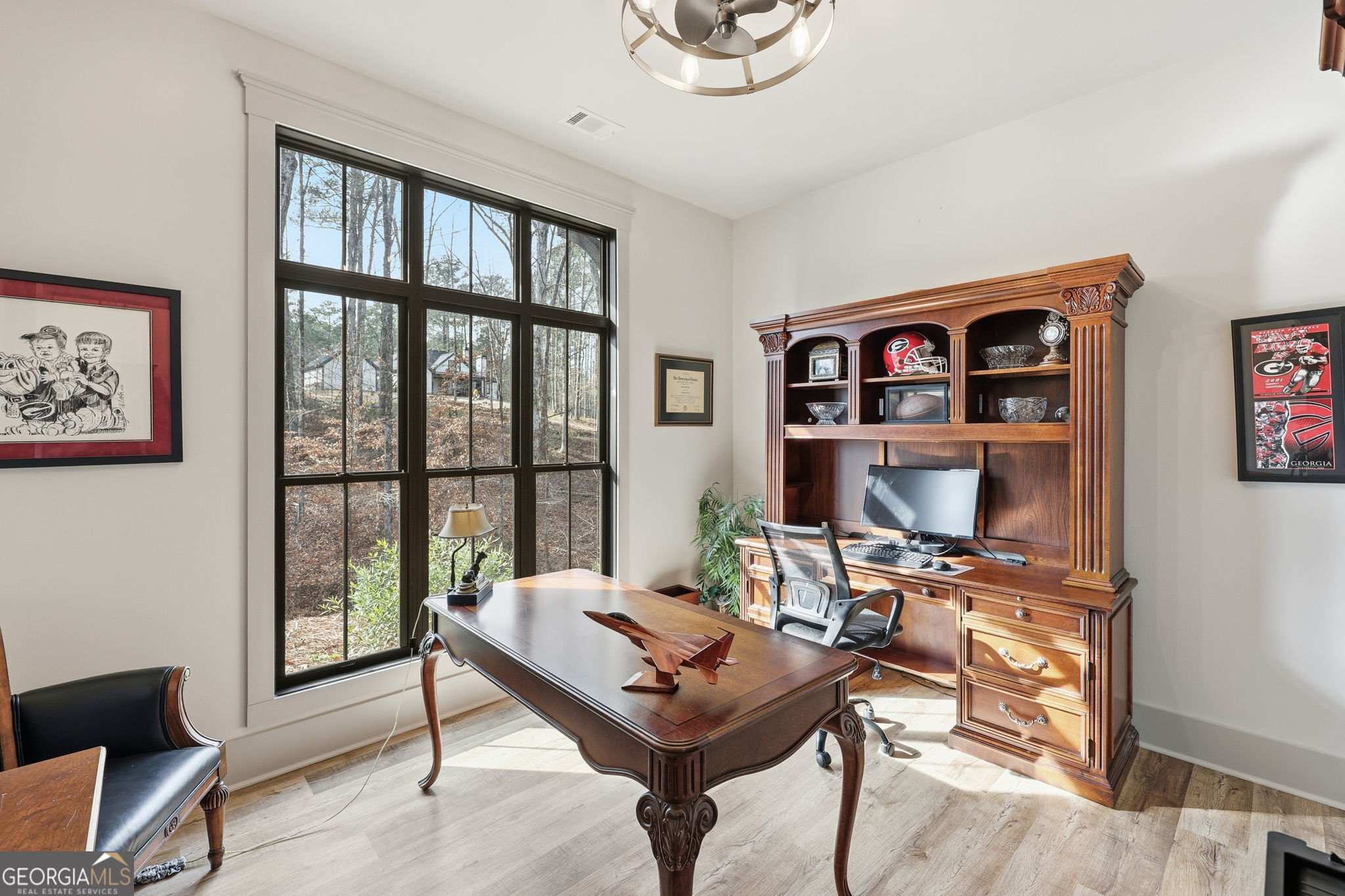 1282 Dean Hill Road Southeast Monroe, GA 30655 - Photo 48 of 58 a living room with furniture a rug and a window