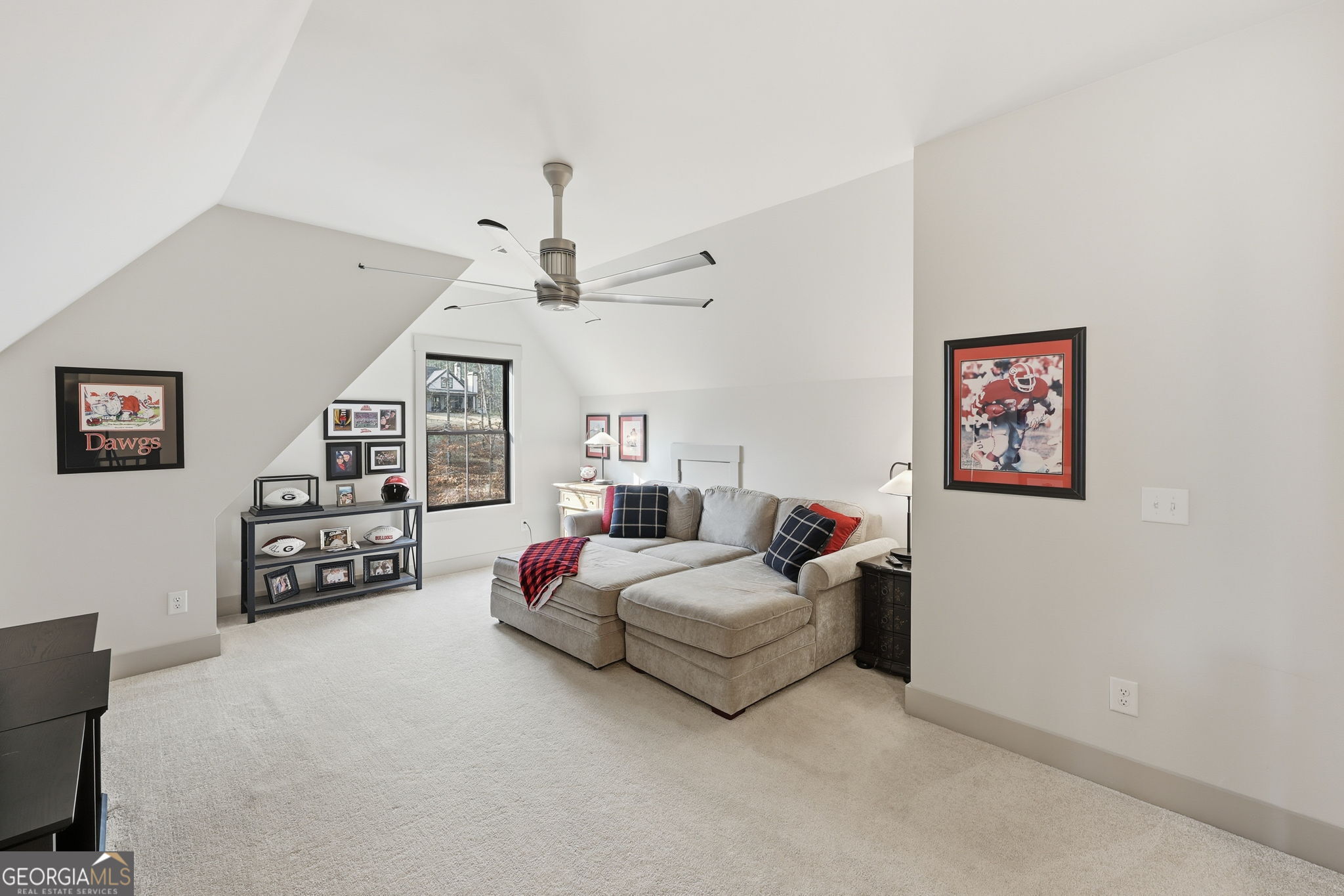 1282 Dean Hill Road Southeast Monroe, GA 30655 - Photo 50 of 58 a bedroom with furniture and a large window