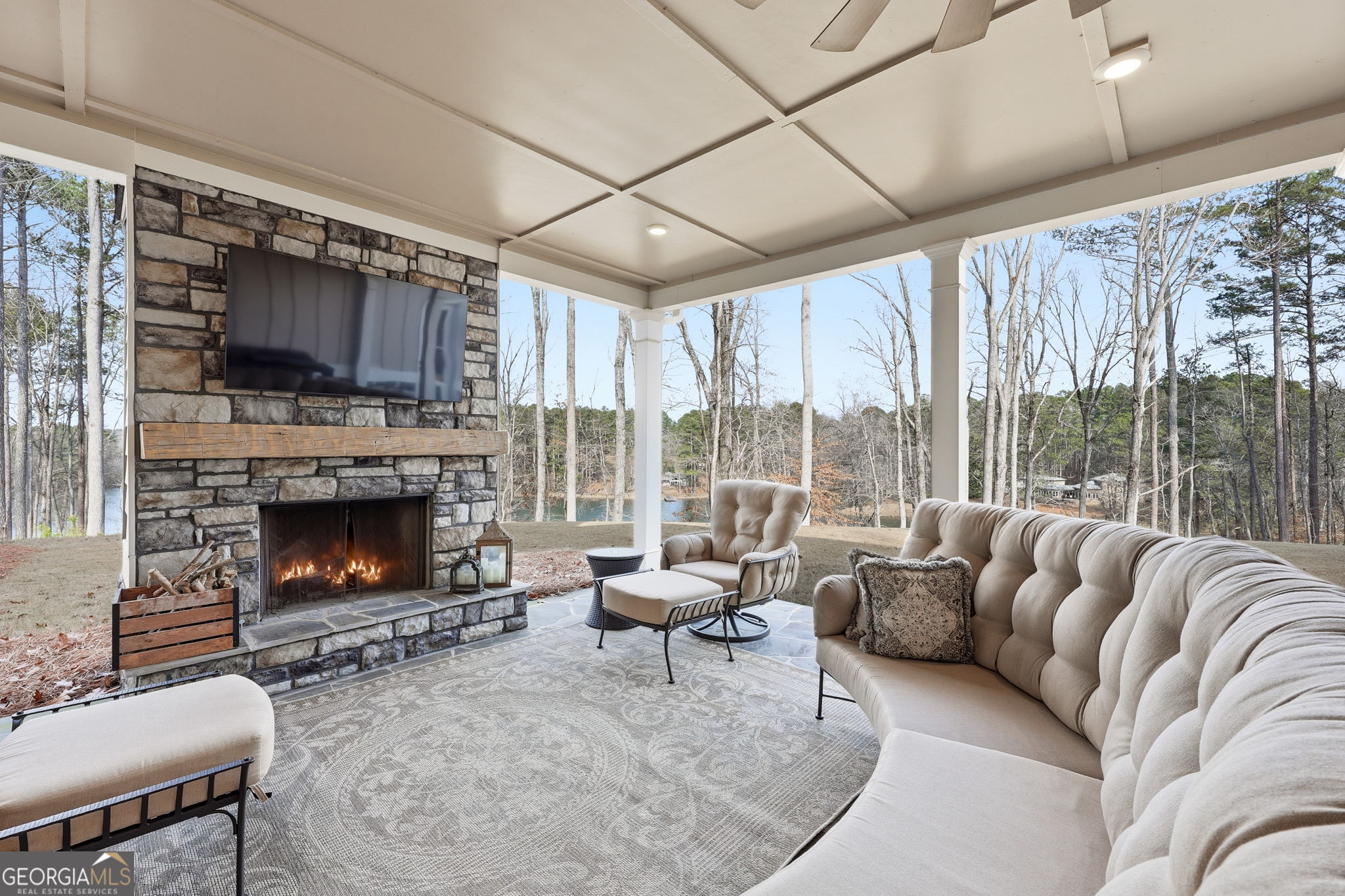 1282 Dean Hill Road Southeast Monroe, GA 30655 - Photo 5 of 58 a living room with furniture a large window and a fireplace