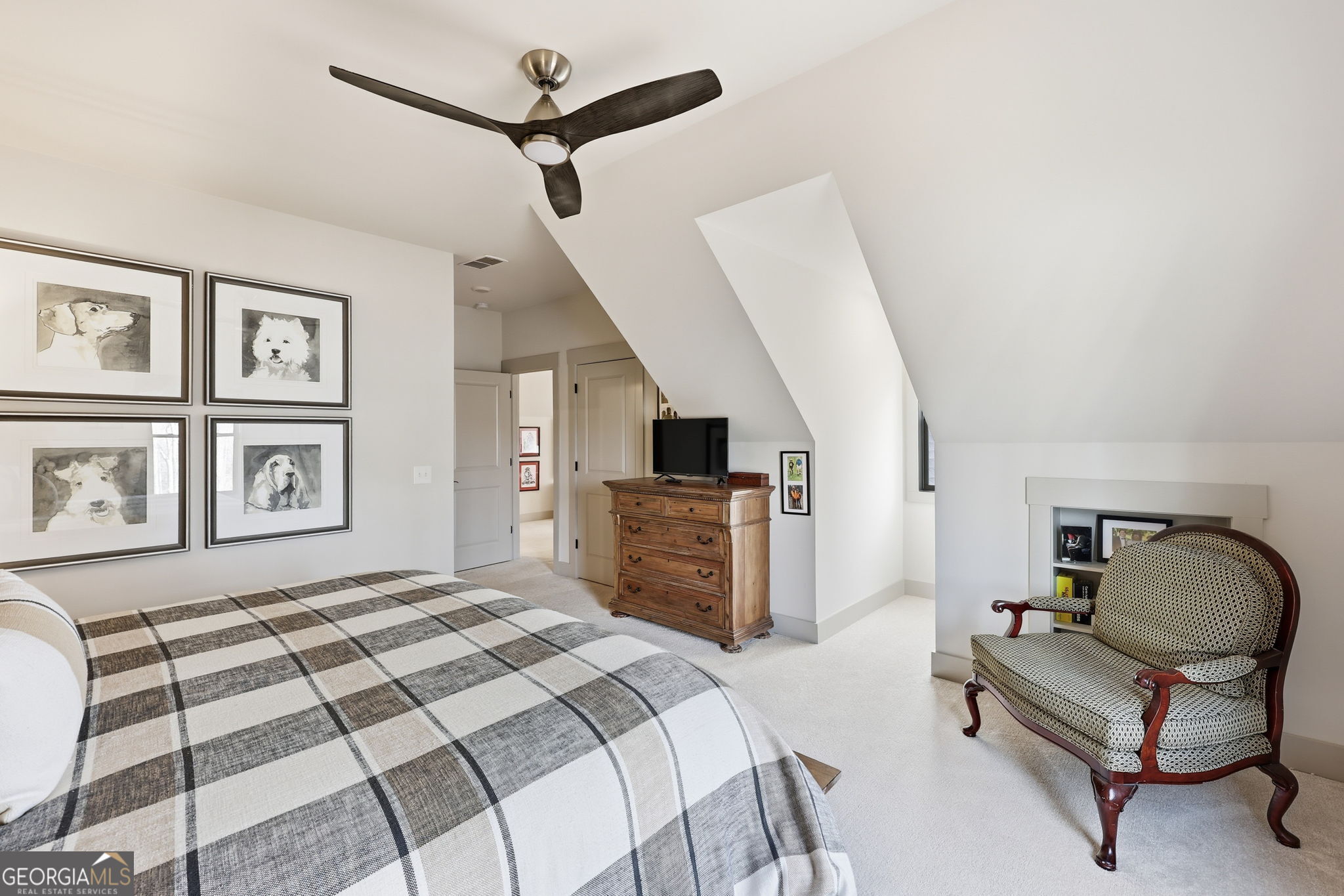 1282 Dean Hill Road Southeast Monroe, GA 30655 - Photo 56 of 58 a bedroom with a bed and a chair