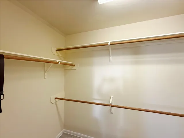 a view of a room with racks on the wall