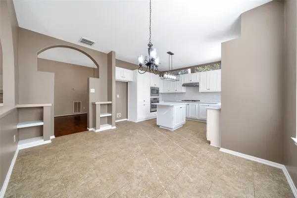 a view of a kitchen with a sink