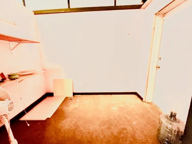 a view of a big room with entryway