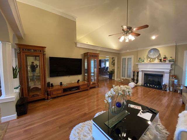 a bedroom with a bed and couch