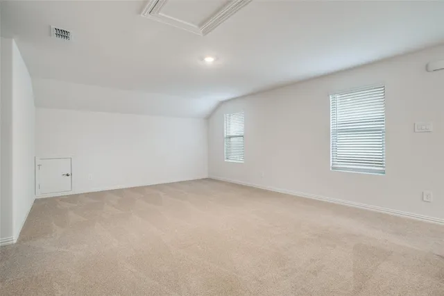 an empty room with an entryway