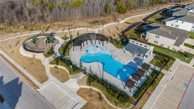 an aerial view of a house with a ocean view