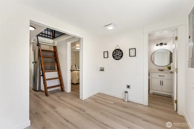 a view of a storage & utility room with closet