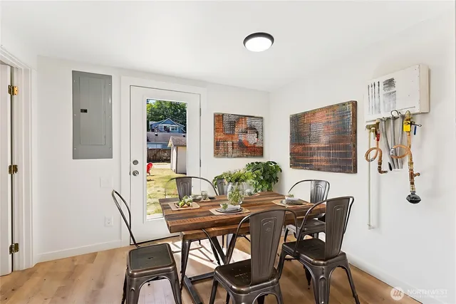 a view of a dining room with furniture window and outside view