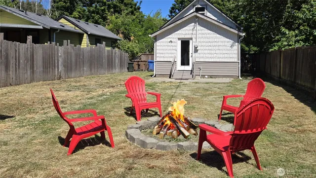 a backyard of a house with seating space