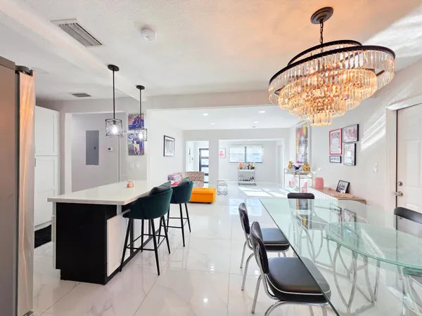 a view of a dining room with furniture
