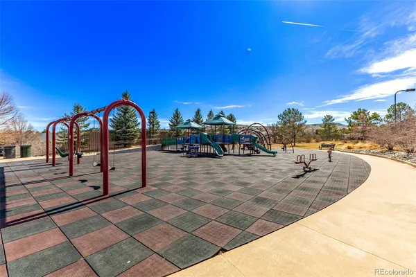 a view of swimming pool with outdoor seating