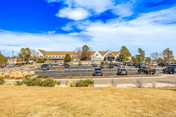 a view of a building with a street