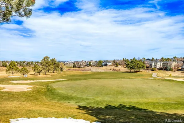a view of an ocean and a mountain