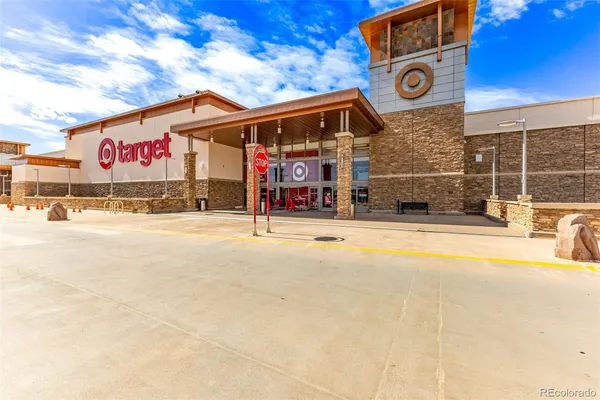 a view of ocean with large building