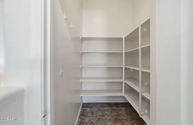 a view of a room with racks on the wall