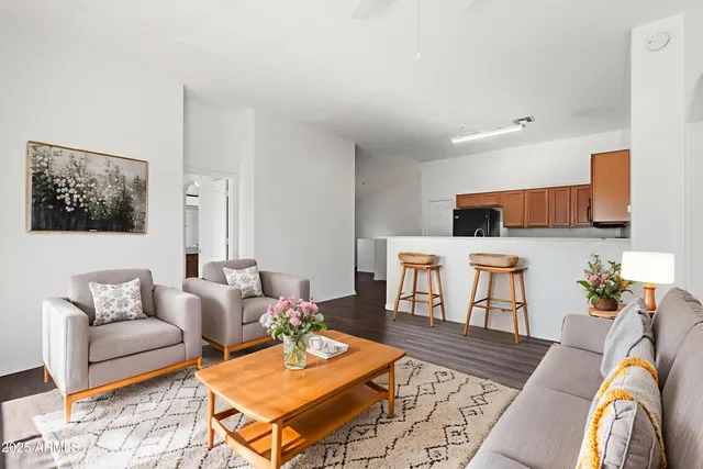 a view of a kitchen with wooden floor