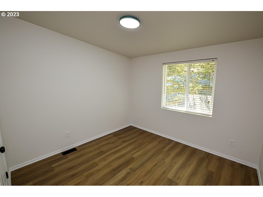 5332 Bridgewater Drive Eugene, OR 97402 - Photo 24 of 28 a view of an empty room with a window