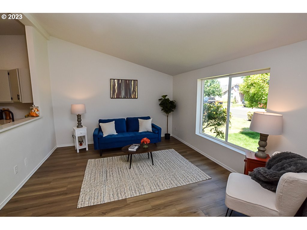 5332 Bridgewater Drive Eugene, OR 97402 - Photo 8 of 28 a living room with furniture and a window