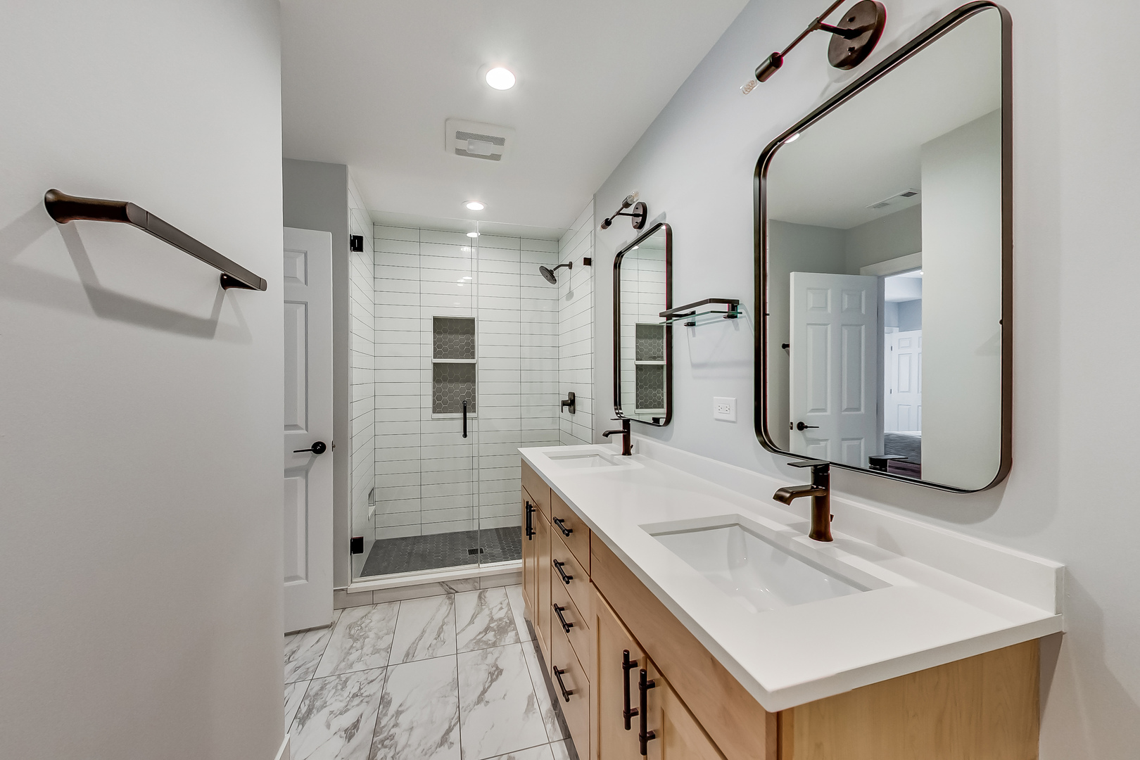 845 West Altgeld Street, Unit 2A Chicago, IL 60614 - Photo 16 of 24 a bathroom with a double vanity sink mirror and double