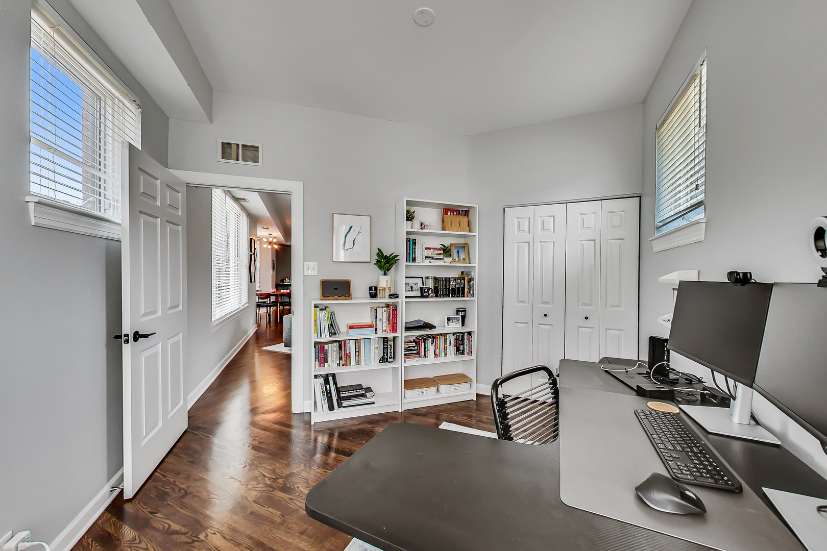 845 West Altgeld Street, Unit 2A Chicago, IL 60614 - Photo 20 of 24 a room with furniture a rug and a book shelf