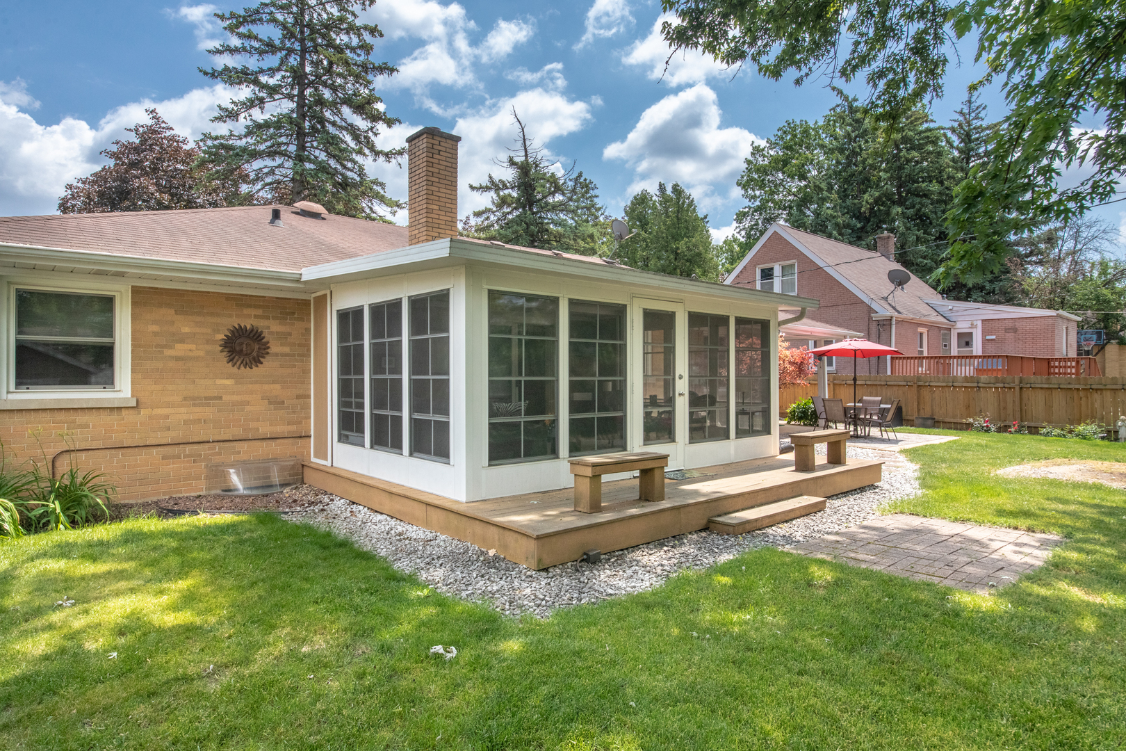 740 North Dee Road Park Ridge, IL 60068 - Photo 19 of 22 a view of a house with a yard and sitting area