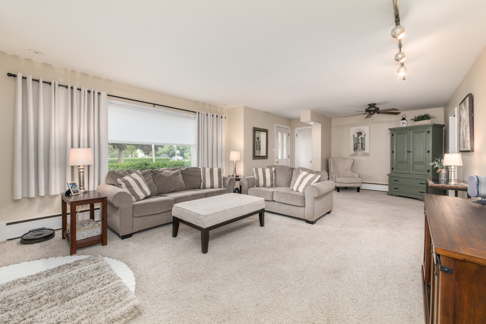 740 North Dee Road Park Ridge, IL 60068 - Photo 2 of 22 a living room with furniture and a large window
