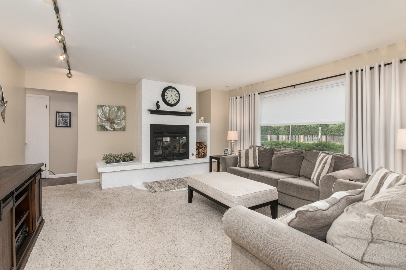 740 North Dee Road Park Ridge, IL 60068 - Photo 3 of 22 a living room with furniture and a fireplace