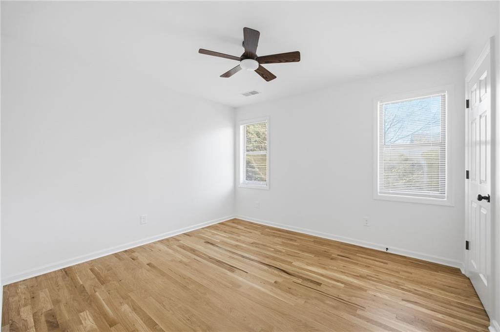 68 Winward Way Southeast Smyrna, GA 30082 - Photo 28 of 42 a view of empty room with ceiling fan