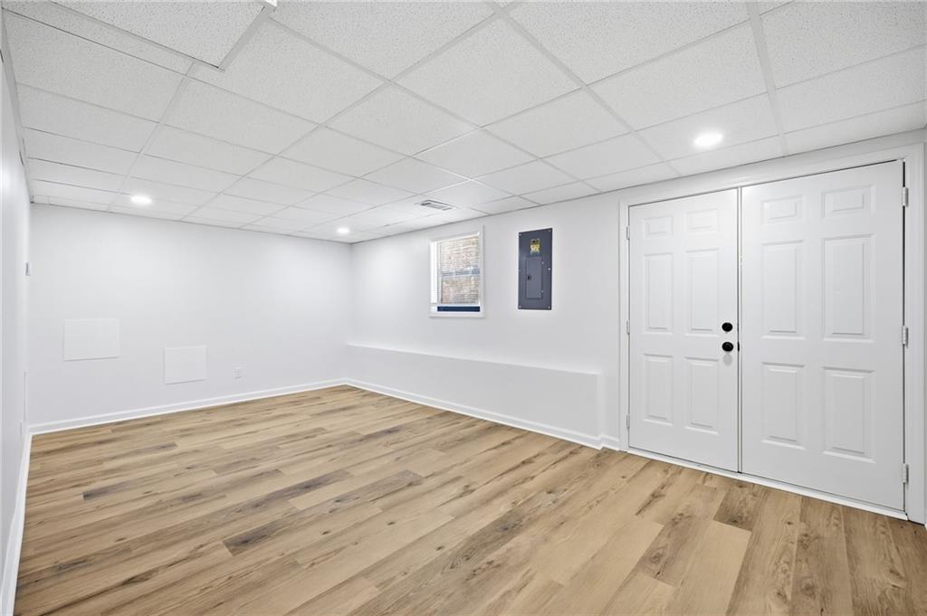 68 Winward Way Southeast Smyrna, GA 30082 - Photo 31 of 42 a view of empty room with wooden floor
