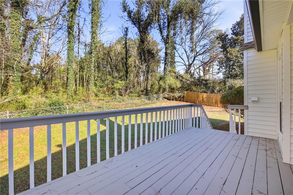 68 Winward Way Southeast Smyrna, GA 30082 - Photo 38 of 42 a view of balcony with wooden floor and fence