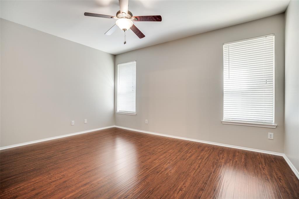 8308 Ram Ridge Road Fort Worth, TX 76137 - Photo 15 of 24 wooden floor in an empty room with a window