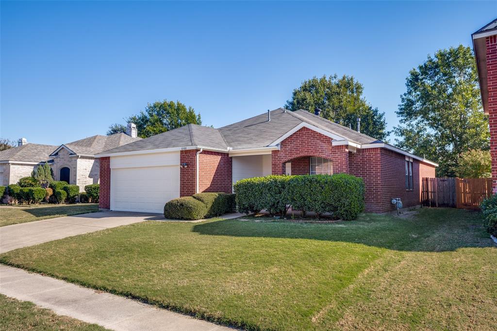 8308 Ram Ridge Road Fort Worth, TX 76137 - Photo 2 of 24 a front view of house with yard and green space