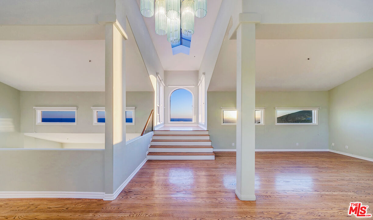 4237 Avenida De La Encinal Malibu, CA 90265 - Photo 16 of 24 a view of entryway and hall with wooden floor