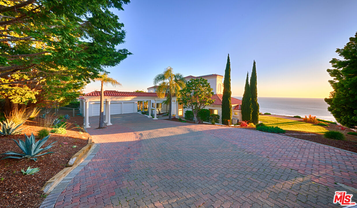 4237 Avenida De La Encinal Malibu, CA 90265 - Photo 6 of 24 a view of an ocean with palm trees