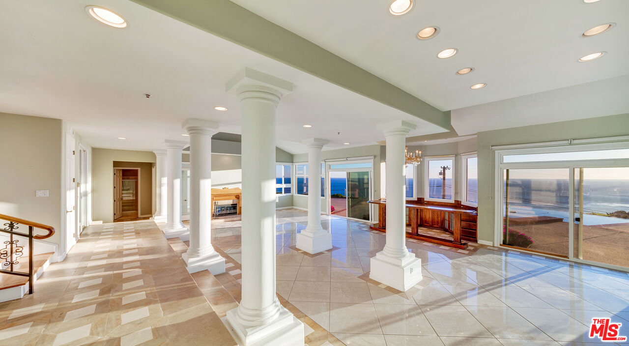 4237 Avenida De La Encinal Malibu, CA 90265 - Photo 10 of 24 a lobby with furniture and a potted plant
